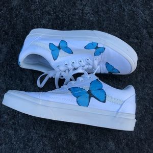 white vans with blue butterflies